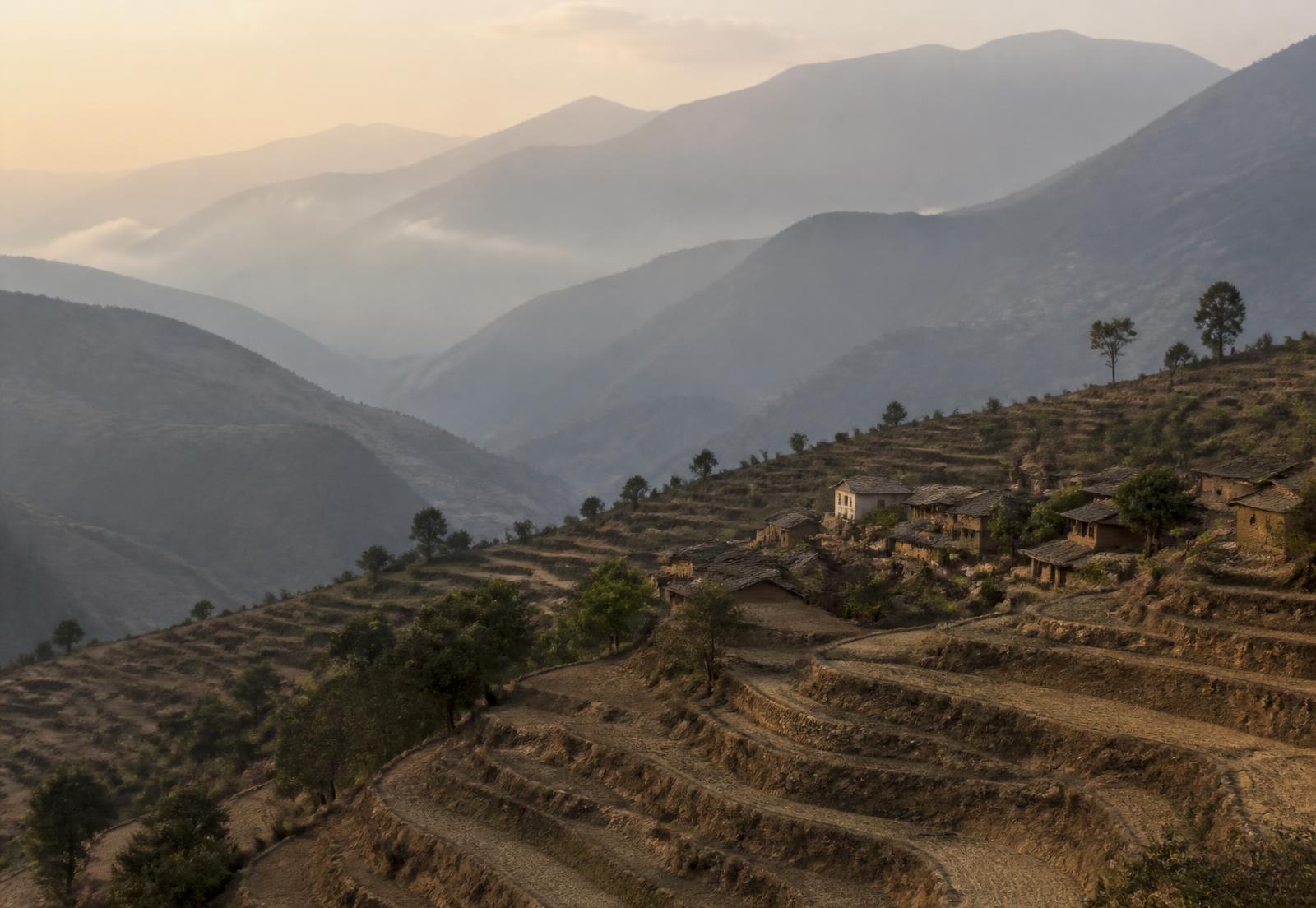Terraced hillsides in Far-Western Nepal near Darchula at golden hour